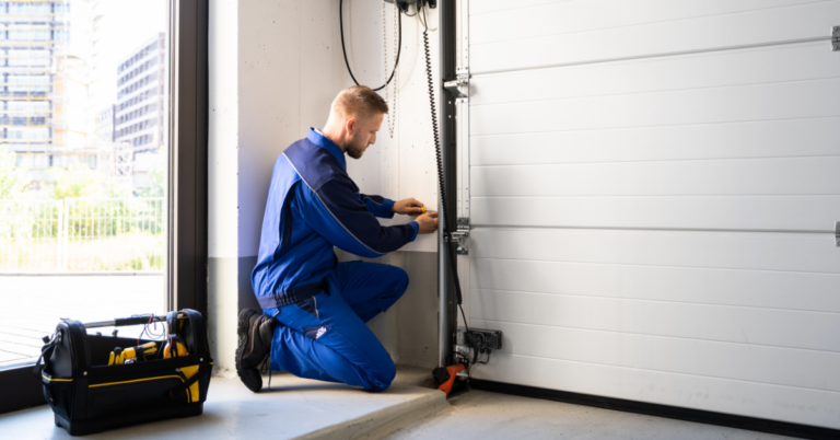 man fixing garage door